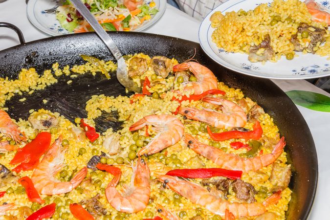 Traditional spanish paella cooked in a pan