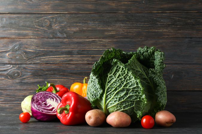Fresh vegetables on wooden background, copy space