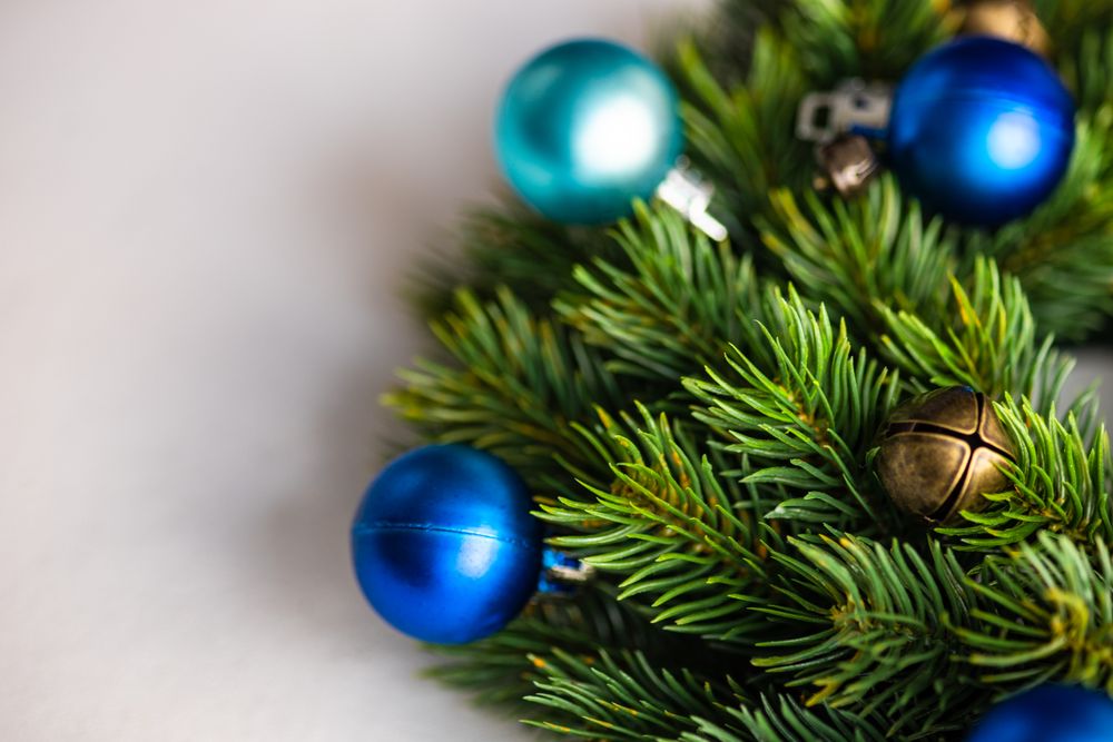 Close up of Christmas wreath with blue baubles