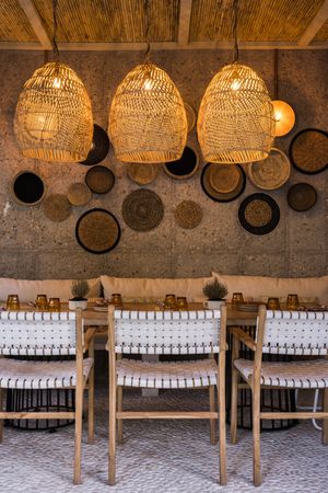 Wicker lamps in street cafe