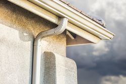 House with New Seamless Aluminum Rain Gutters