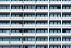 Hotel building with a lot of balconies and windows