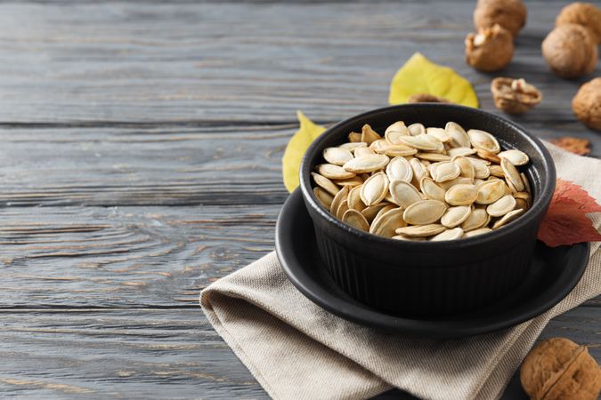 Cooking ingredients for fall season - pumpkin seeds, pumpkin
