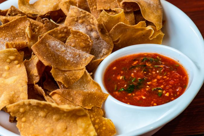 Mexican corn chips with salsa sauce
