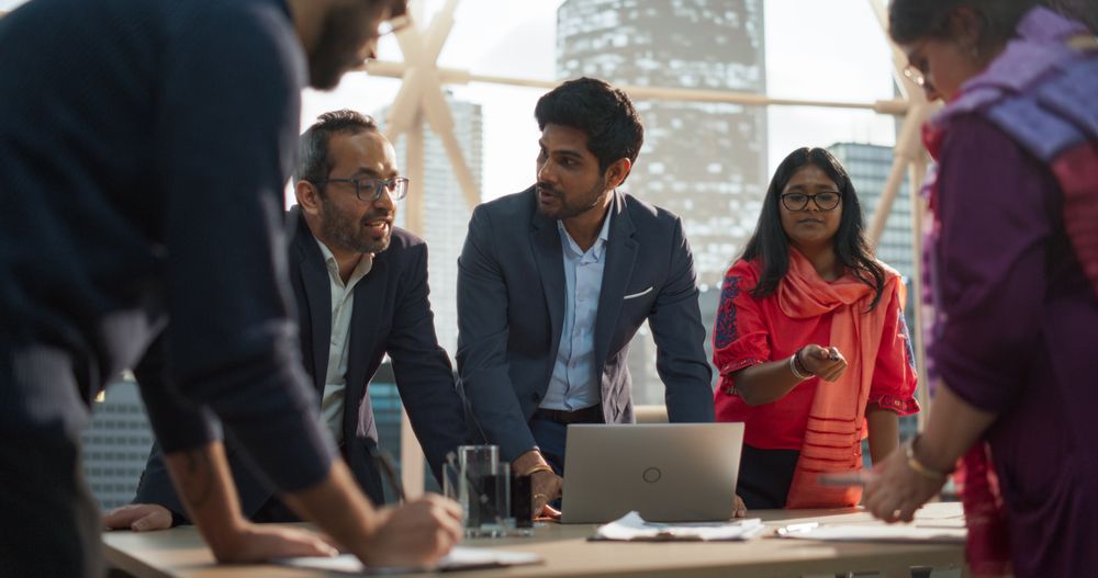 Working in Modern Office, Employees Having a Conversation in a Conference Room