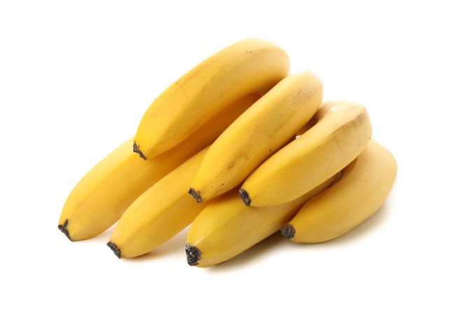 Banana cluster isolated on blank background. Fresh fruit