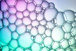Abstract background bio technology, macro photography foam and water with gradient background. Molecule multicolor backgorund