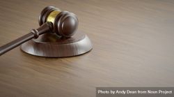 Gavel Resting on a Table with Room For Text. 5aXLjd