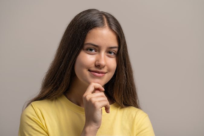 Portrait of a confident and intelligent young woman thinking.