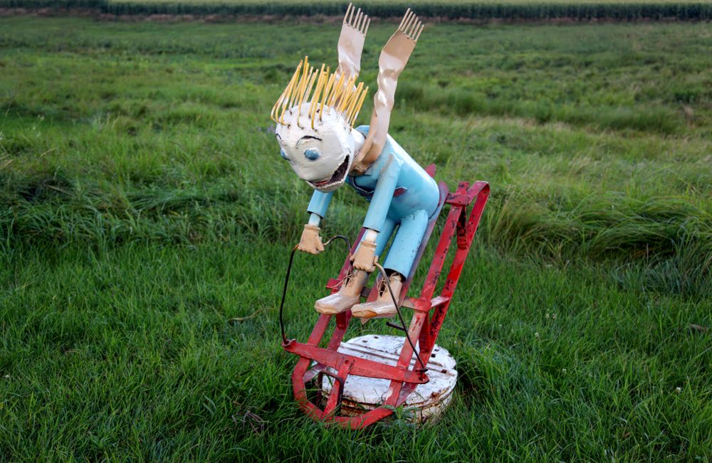 Figure sledding down, Porter Sculpture Park, Montrose, South Dakota
