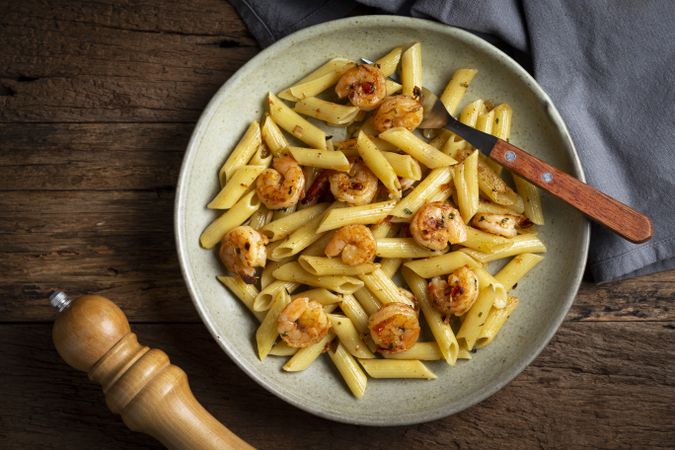 Penne pasta with grilled shrimp.