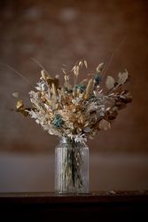 Dried flowers in glass jar