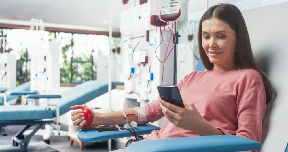 Woman Donating Blood For People In Need.