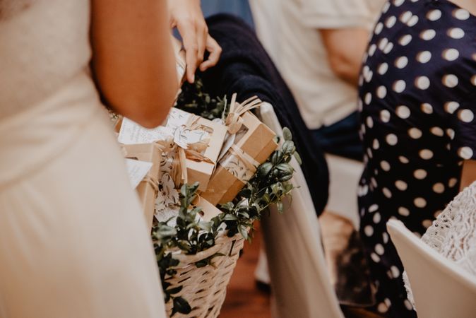 Woman with presents in hamper