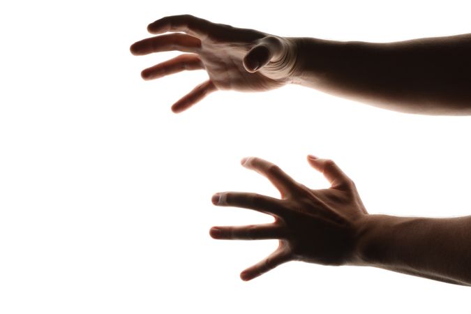 Scary human hands isolated on plain background
