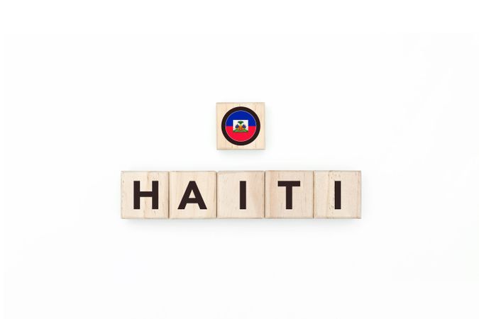 Wooden blocks bearing the name and flag of Haiti.