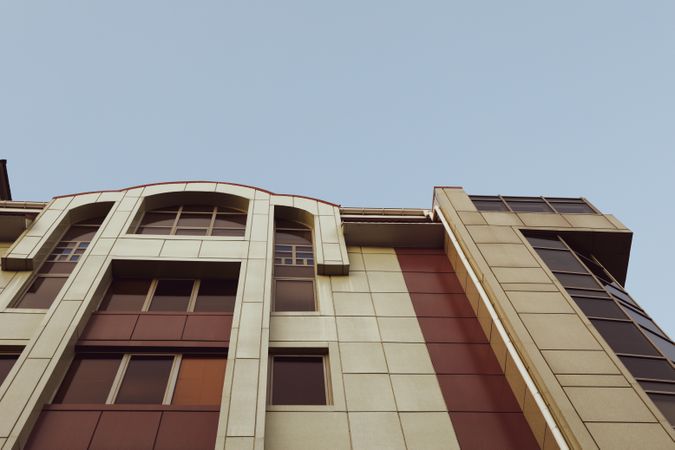 Beautiful building against blue sky, space for text