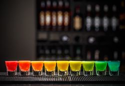Row of colorful rainbow shots