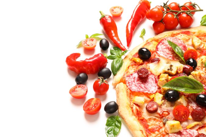 Delicious pizza and ingredients isolated on blank background, close up