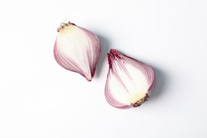 Flat lay composition with red onion on plain background
