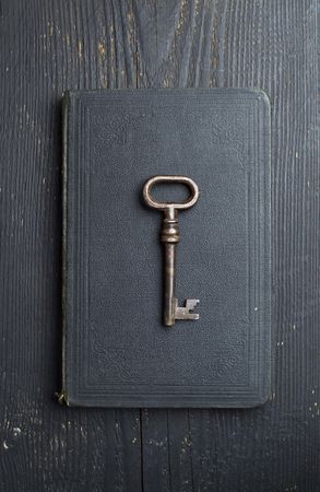Vintage Key over dark leather book cover