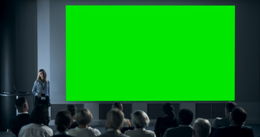 Corporate Event: White Female Tech CEO Giving Presentation On Green Screen Chromakey Projector Display To Colleagues In Conference Room Of Startup Office.