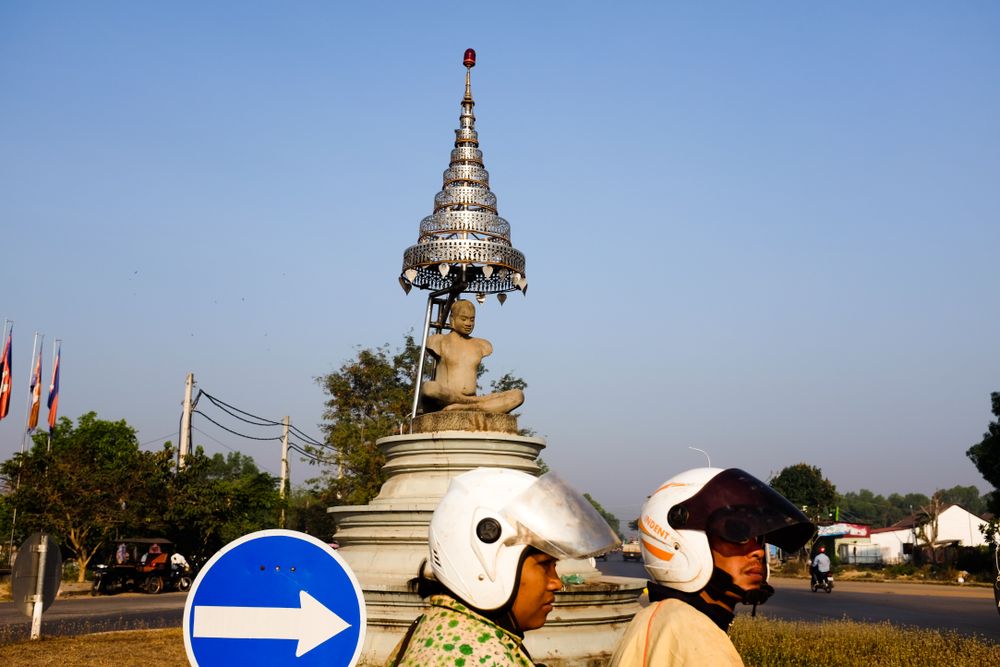 Siem Reap, Cambodia - Feb 14, 2018 - Couple riding moped