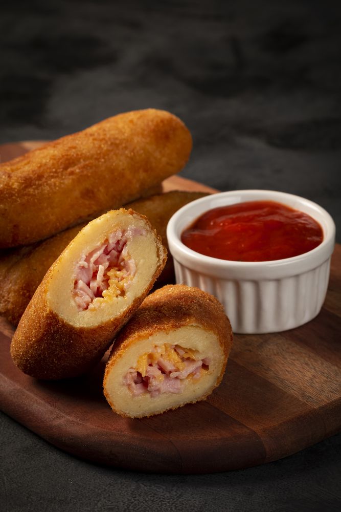 Fried risoles or Risol. Risoles stuffed with cheese and ham.
