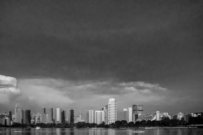 Grayscale photo of city skyline in Singapore