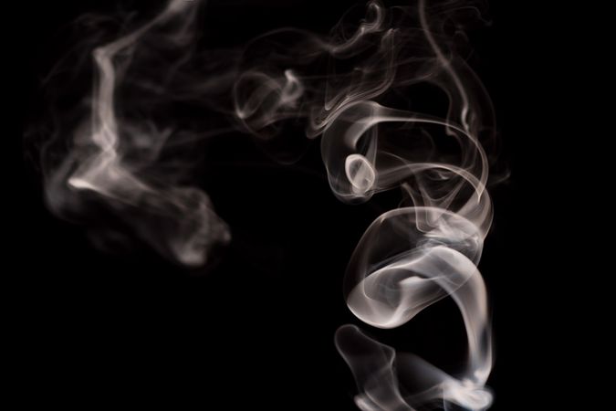Abstract smoke moving on dark background