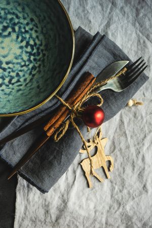 Christmas table setting with reindeer ornament