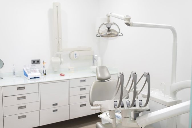 Horizontal image of a sterile dentist office room