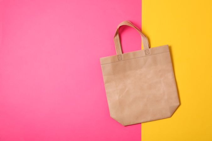 Eco bag on two color background, space for text
