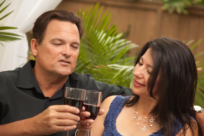 Couple Drinking Wine On Date