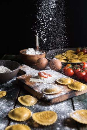Homemade ravioli made with parmesan cheese, tomato and basil.