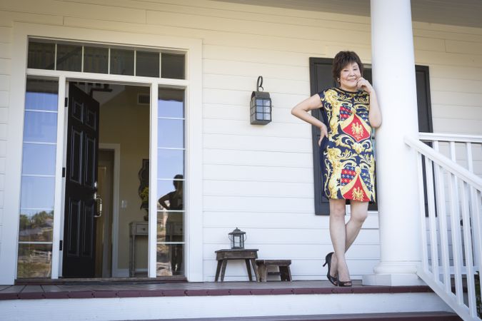 Chinese Woman On Her Front Porch