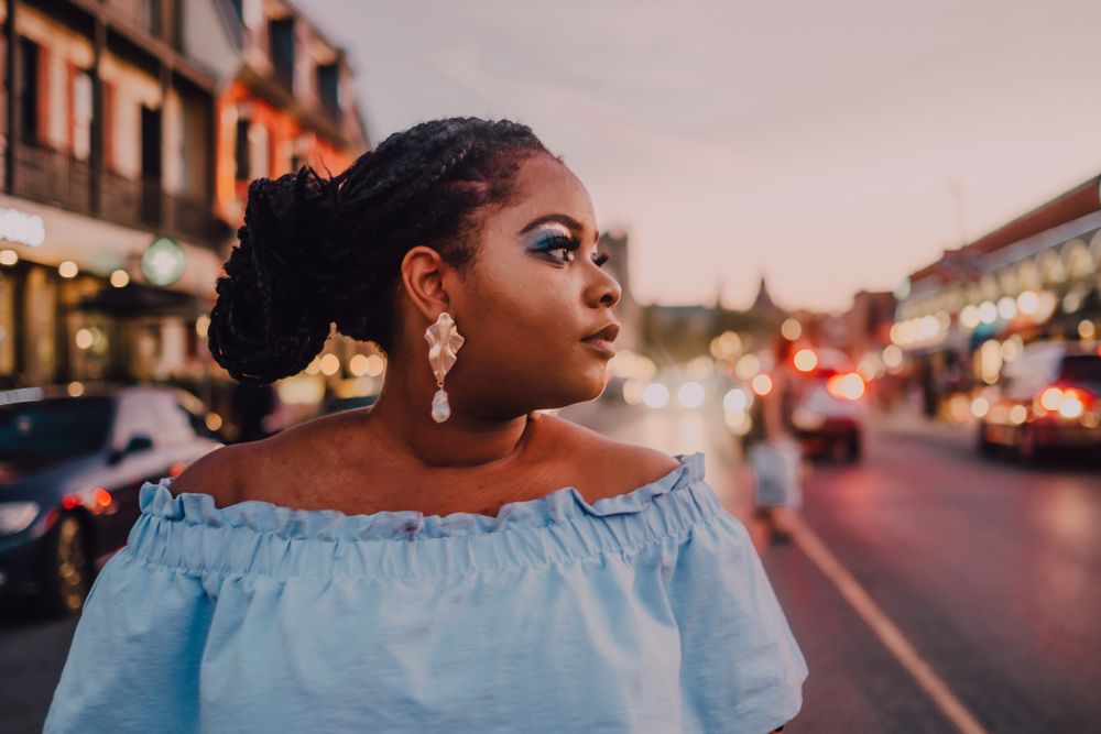 Content trendy Black woman on street