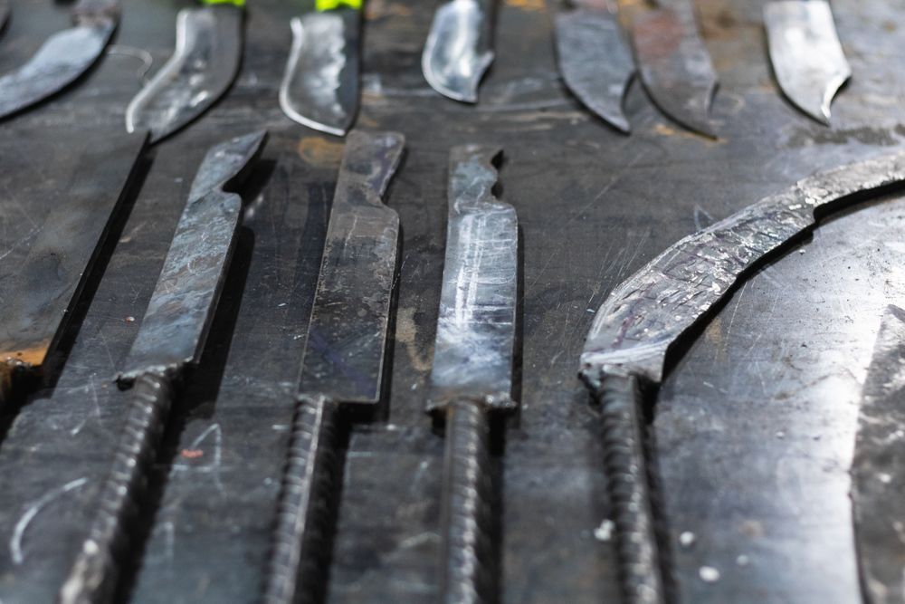Different metal sharp tools at workbench