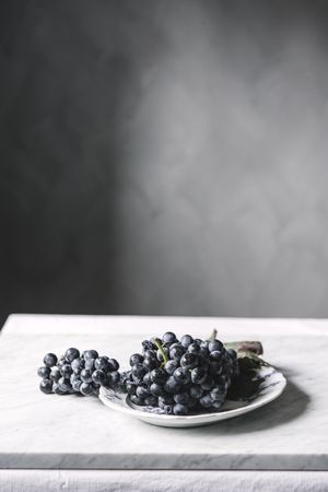 Bunch of grapes on plate