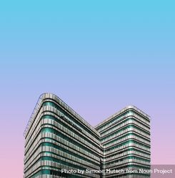 Building with green details against gradient sky 4M2lzb