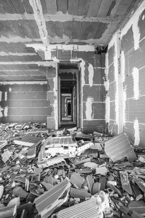 Building under construction with demolition waste
