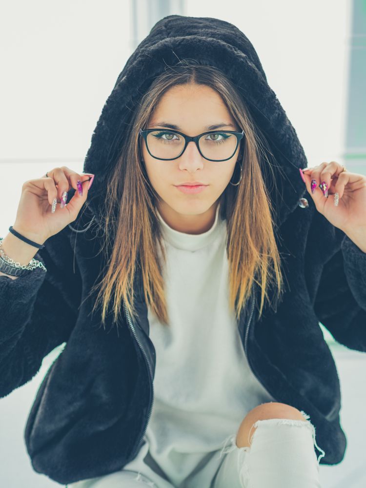 Young woman over a glasses ground