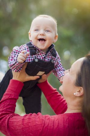 Little Baby Boy Having Fun With Mommy Outdoors