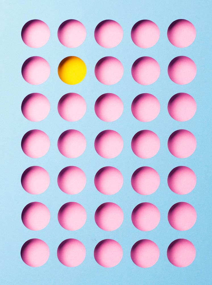 Circle pattern cut out with yellow, pink and blue