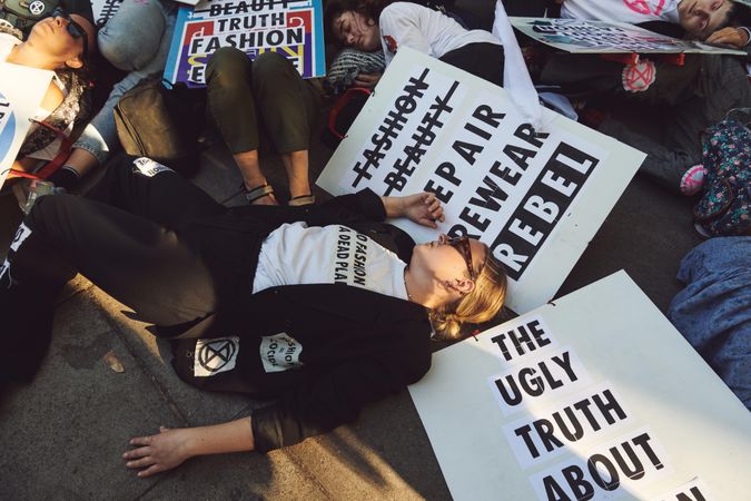 London, England, United Kingdom - September 15th,2019: Protestors lying down with anti-fur signs