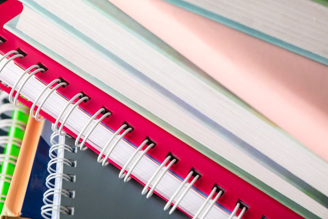 Many school copybooks as background, space for text