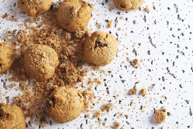 Homemade cookies with crumbs on table
