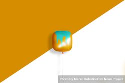 Square orange balloon with paint dripping on it on an orange background 47LoPb