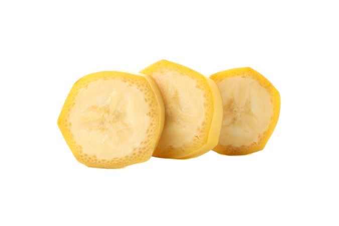 Banana slices isolated on blank background. Fresh fruit