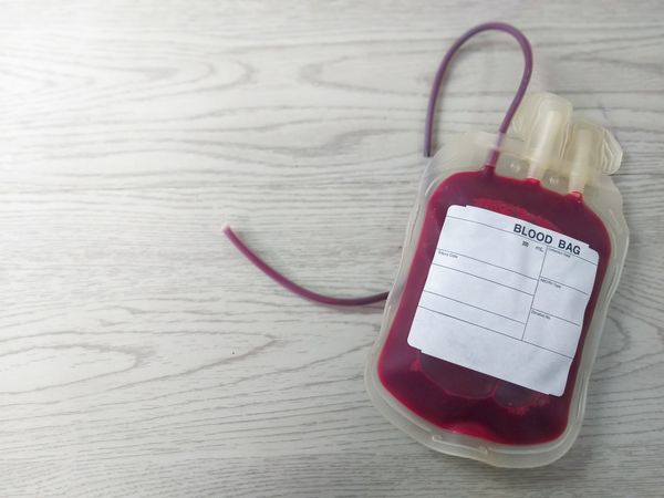 Labeled Blood Bag for Medical Transfusion on White Background